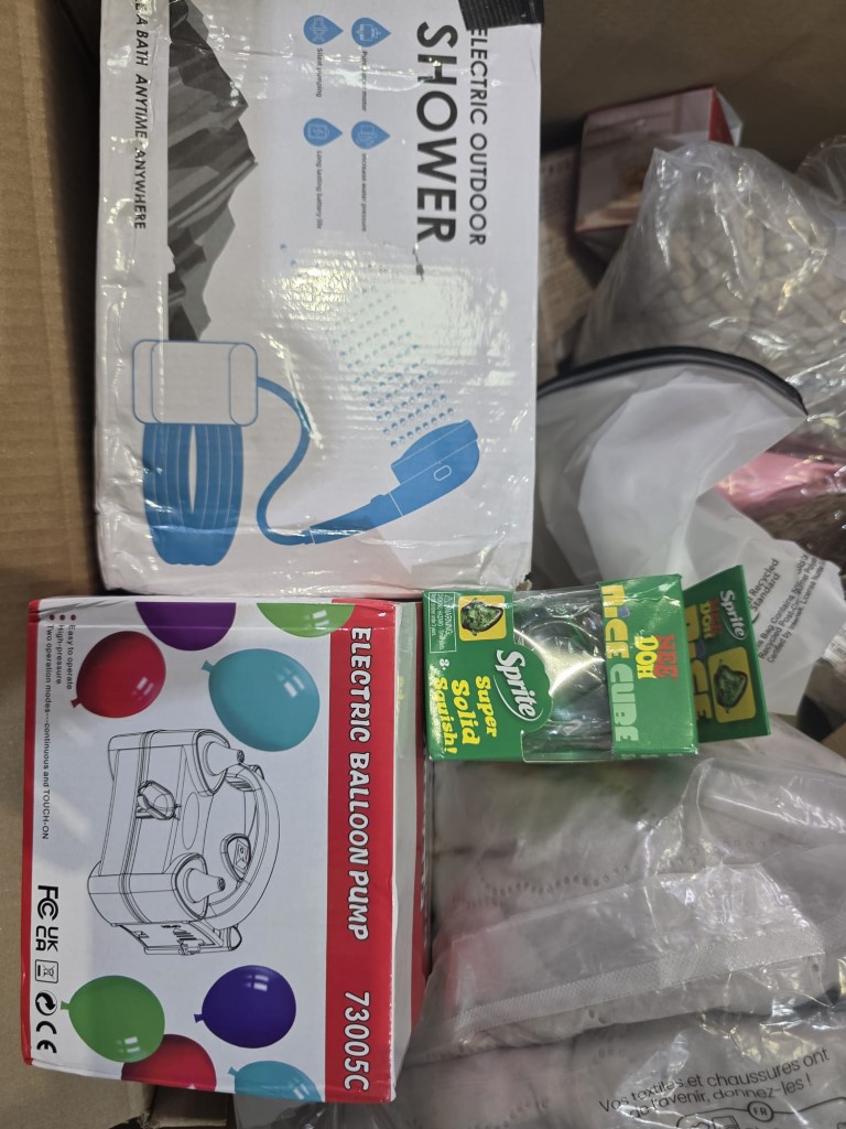Sealed master box containing small kitchen electricals and boxed countertop appliances.