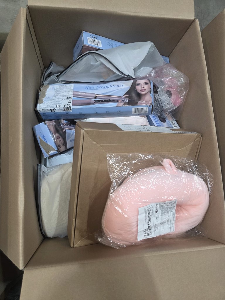 Master cardboard carton packed with packaged trending accessories and viral social media products.