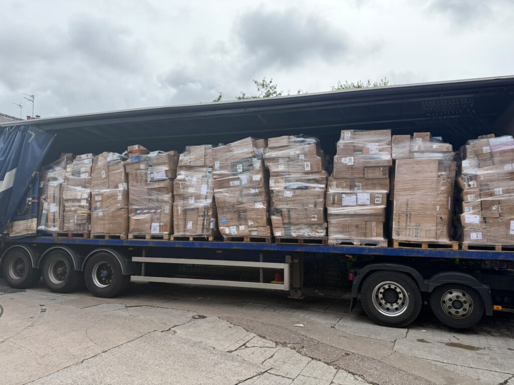 Full truckload of wrapped 7-foot Amazon smart pallets ready for wholesale distribution