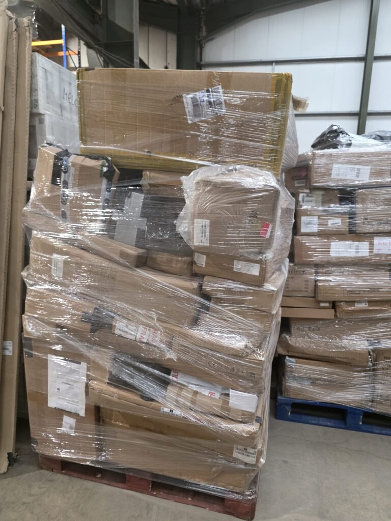 Stacked Amazon fulfillment stock on a securely wrapped pallet